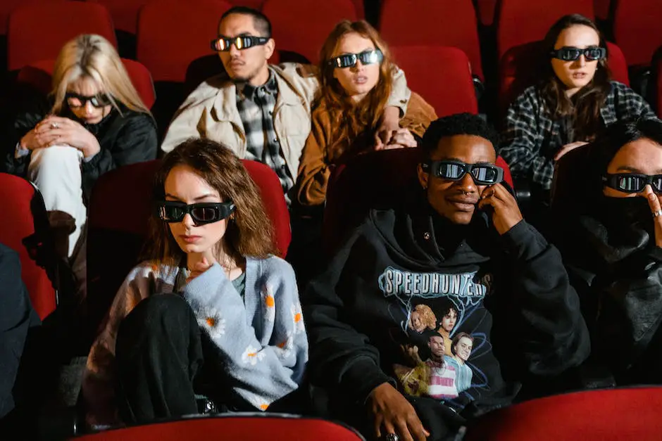 A still image from an independent cinema, showing a diverse group of characters watching a movie in a cozy theater setting.